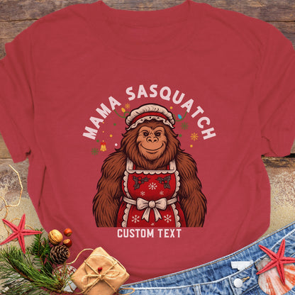 Red t-shirt with 'Mama Sasquatch' graphic and customizable text.
