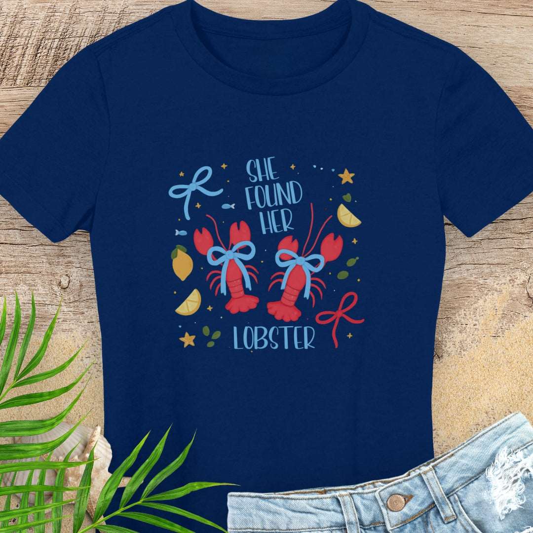 Navy blue  woman's t-shirt with colorful lobster design and text She Found Her Lobster.