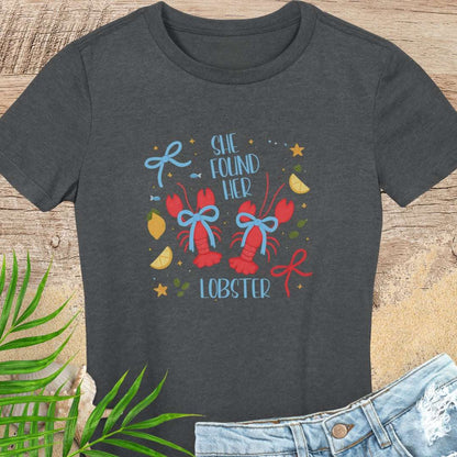 Dark gray  woman's t-shirt with colorful lobster design and text She Found Her Lobster.
