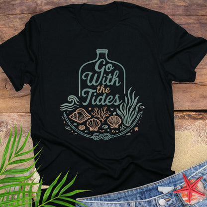 Black Go With the Tides t-shirt with ocean bottle design, seashells, and coral artwork.