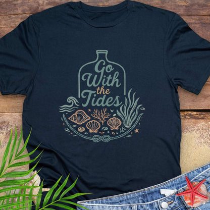 Navy blue Go With the Tides t-shirt with ocean bottle design, seashells, and coral artwork.