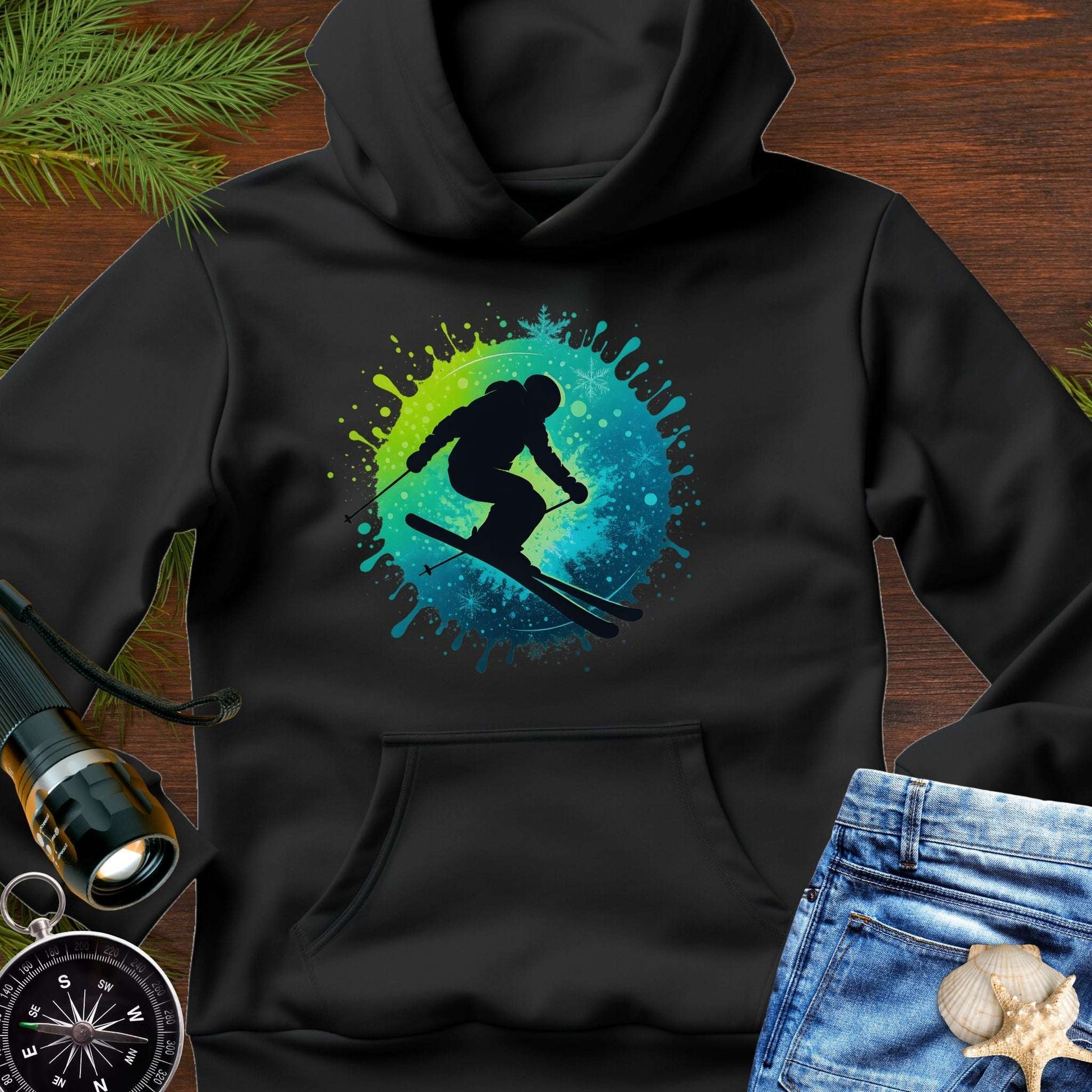Black hoodie with a colorful skiing graphic.