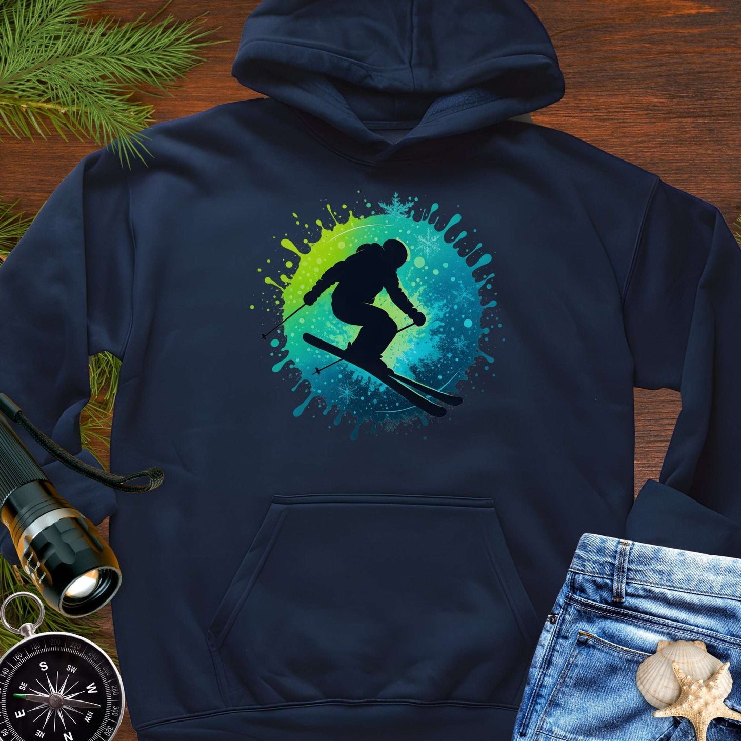 Navy blue hoodie with a colorful skiing graphic.