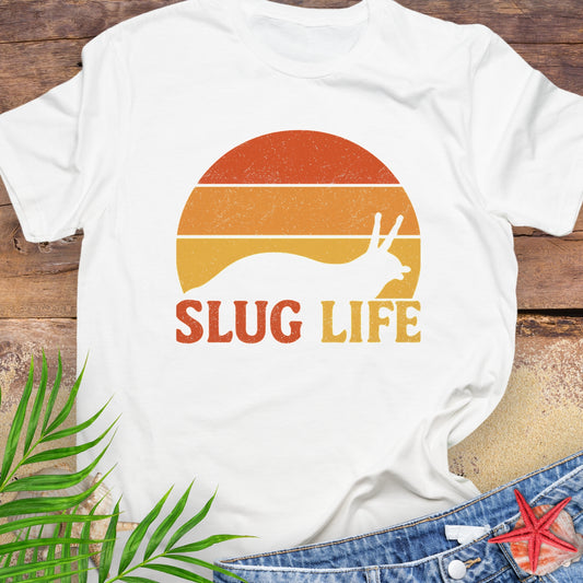 White t-shirt with 'Slug Life' sunset graphic.