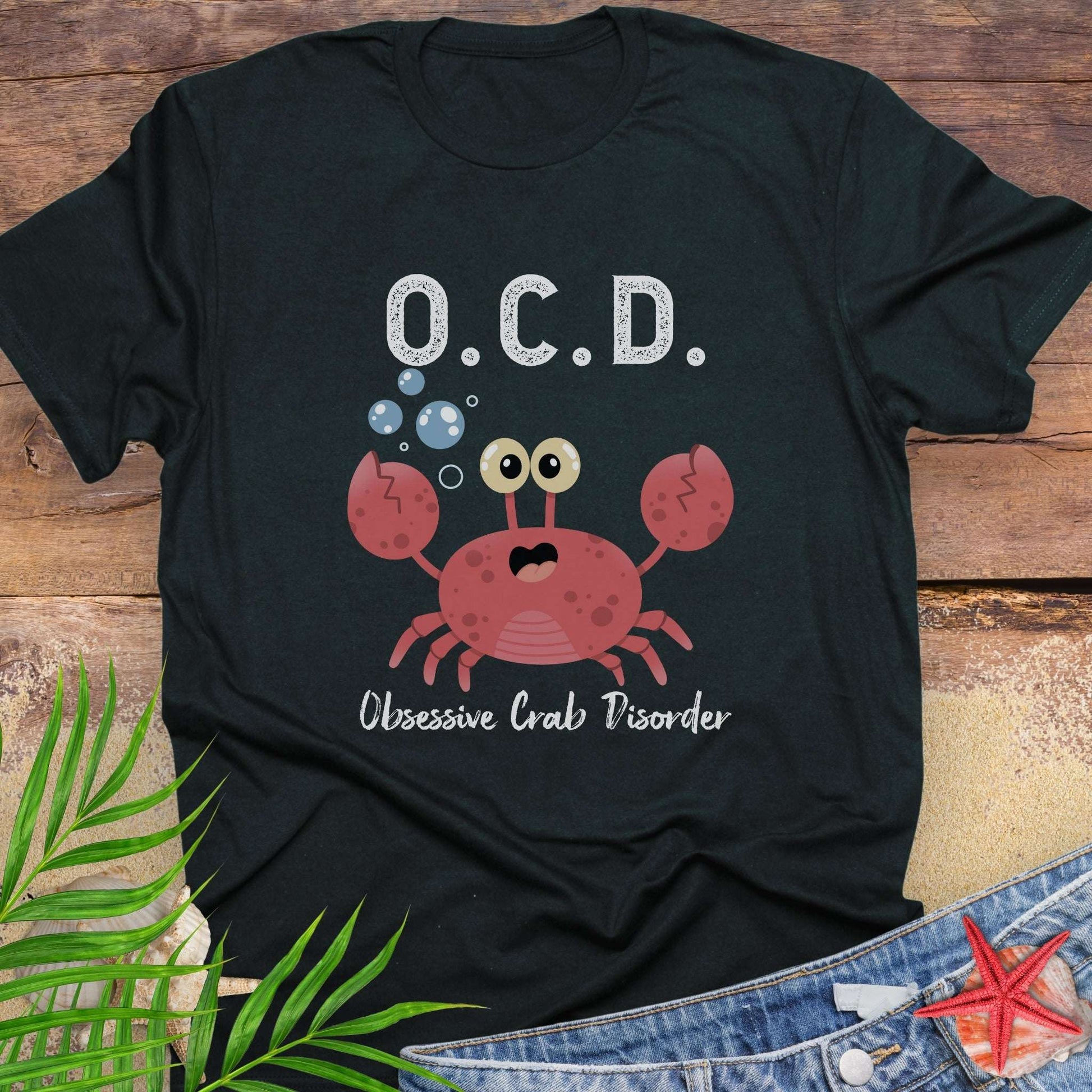 Black t-shirt with a cartoon crab and text OCD Obsessive Crab Disorder.