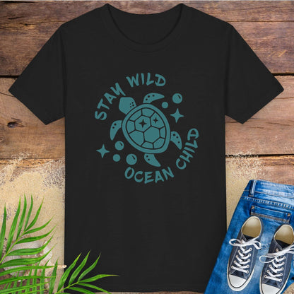 Black t-shirt with sea turtle graphic and text stay wild ocean child.