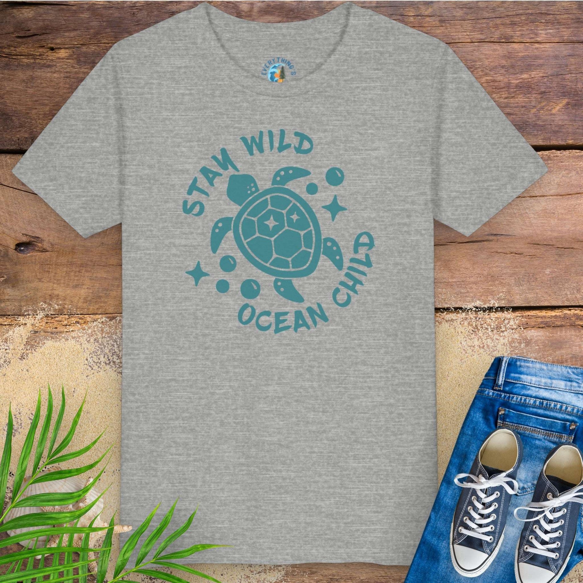 Gray t-shirt with sea turtle graphic and text stay wild ocean child.