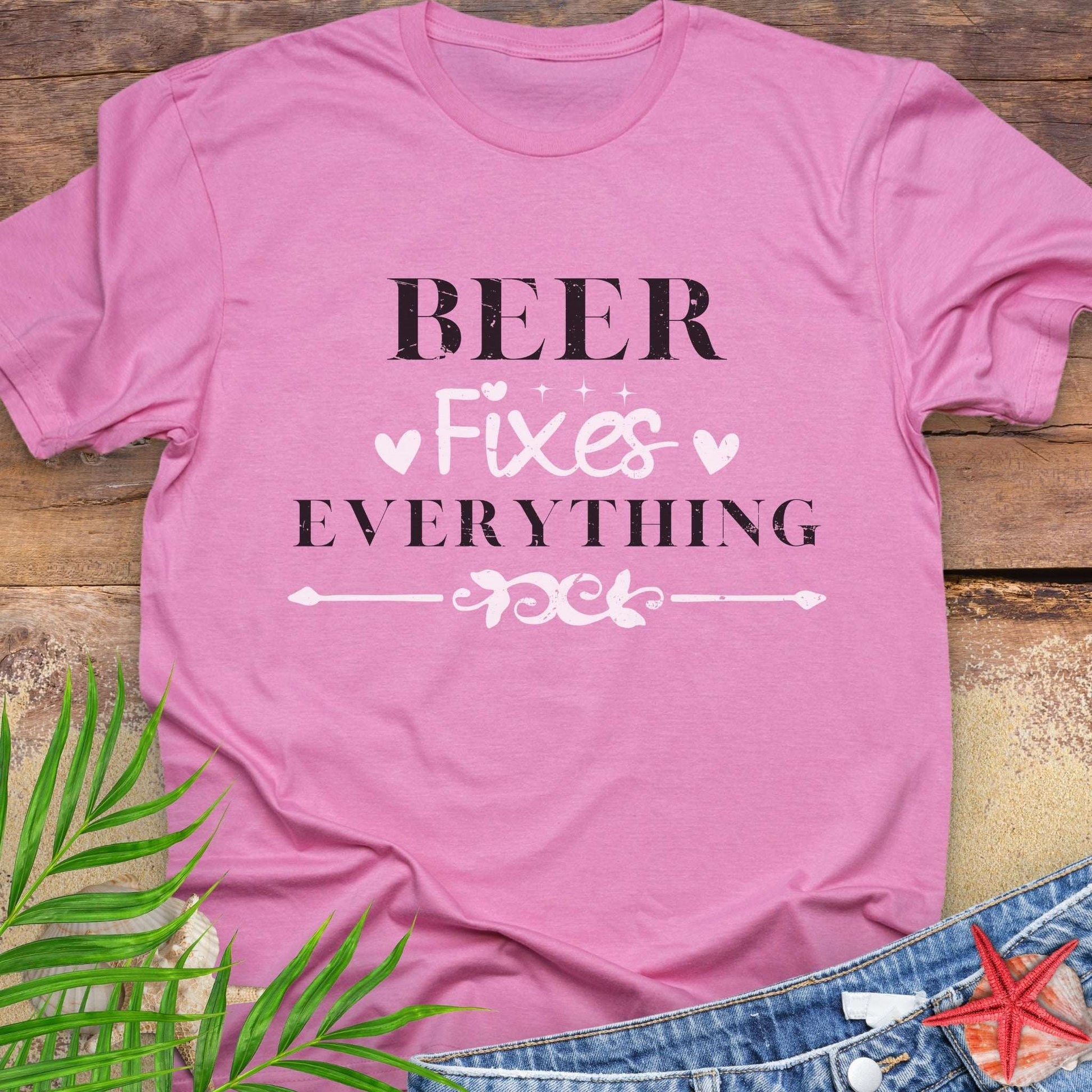 Hot Pink unisex t-shirt with “Beer Fixes Everything” text and decorative pink hearts and scroll graphic.