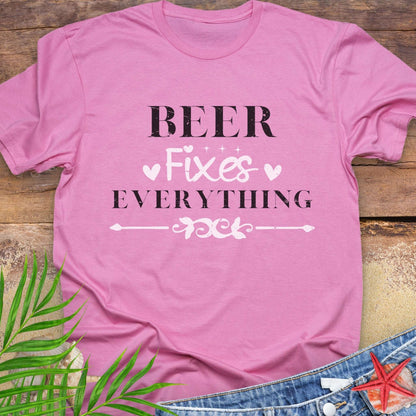Hot Pink unisex t-shirt with “Beer Fixes Everything” text and decorative pink hearts and scroll graphic.