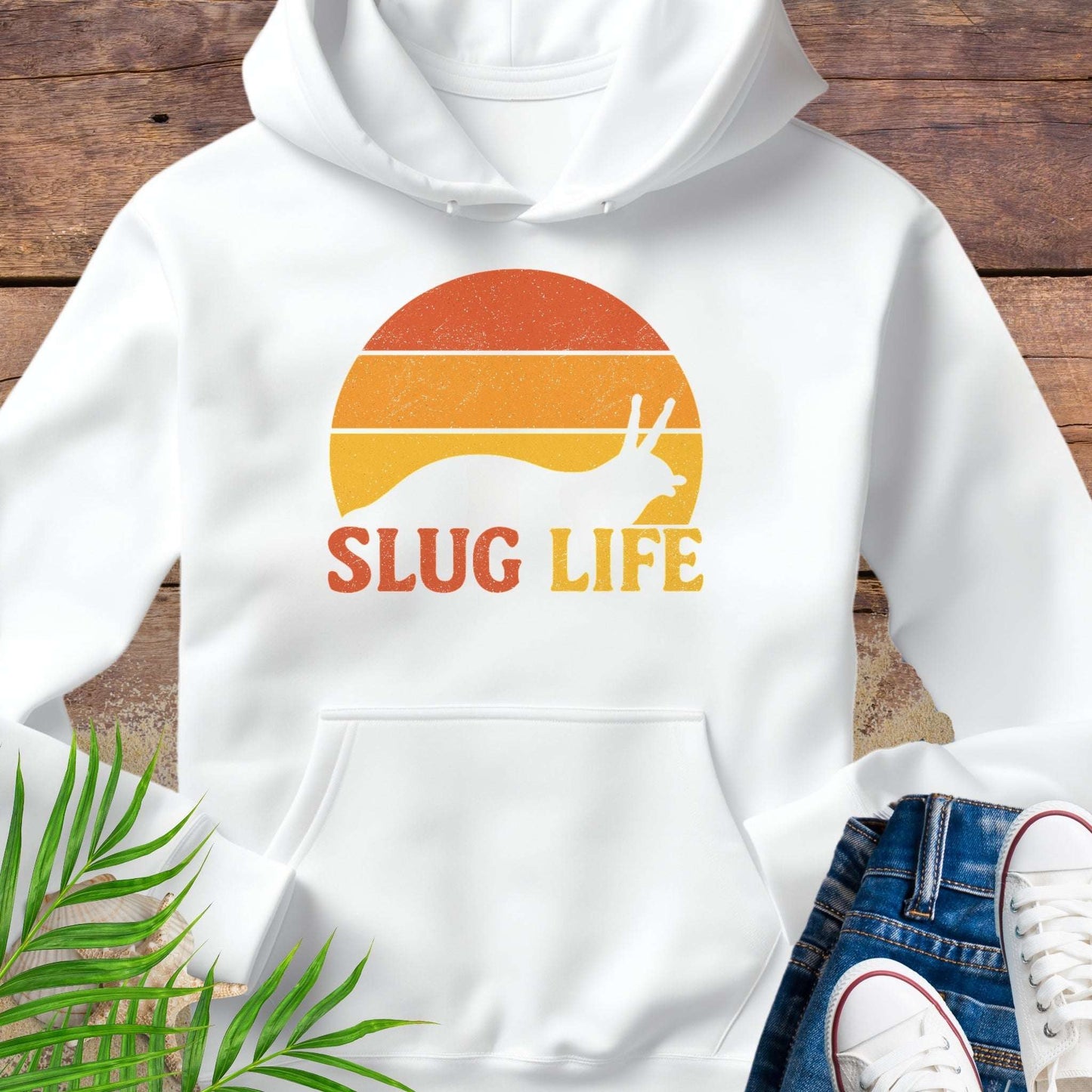 White hoodie with 'SLUG LIFE' retro sunset design.