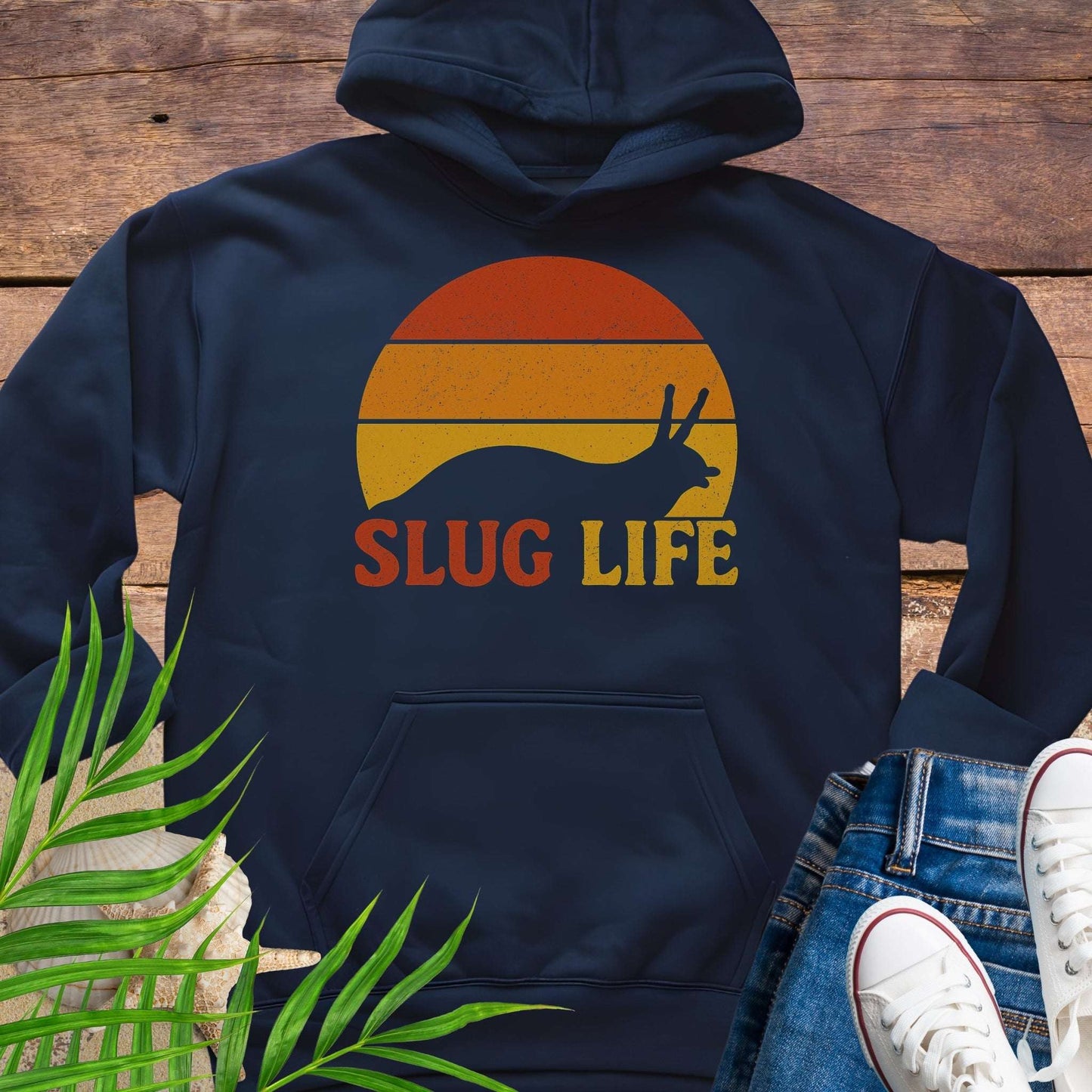 Navy blue hoodie with 'SLUG LIFE' retro sunset design.