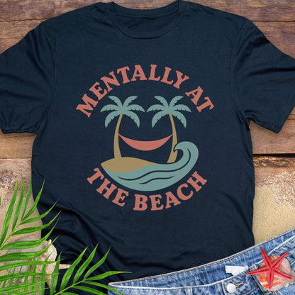 Navy blue t-shirt with 'Mentally at the Beach' text with retro design of palm trees with a hammock, and gentle ocean waves.