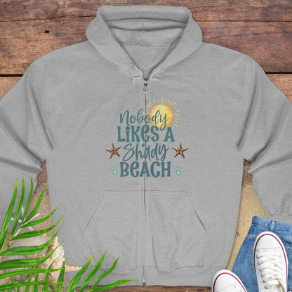 Gray hoodie with beach-themed graphics and text Nobody Likes a Shady Beach.