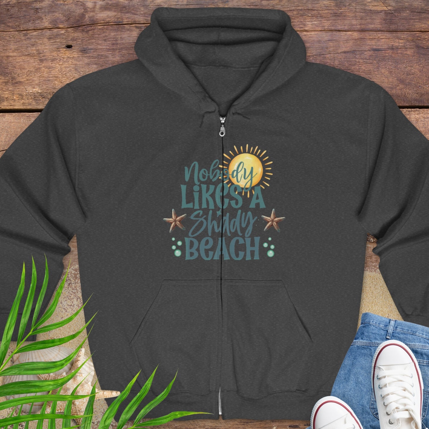 Dark Heather Gray hoodie with beach-themed graphics and text Nobody Likes a Shady Beach.