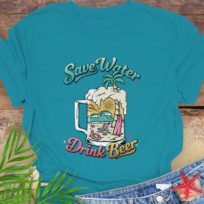 Teal unisex t-shirt with “Save Water Drink Beer” in colorful retro text and a beach scene inside a beer mug