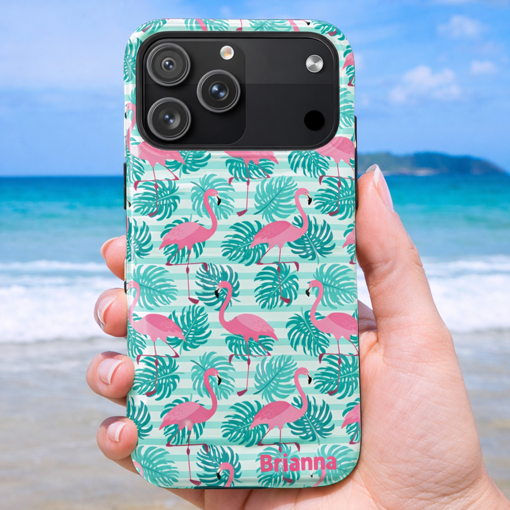 Phone case with flamingo and leaf pattern with optional personalization.