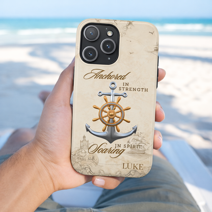 Phone case with anchor and ship wheel design with text 'Anchored in Strength soaring in Spirit' that can be personalized.