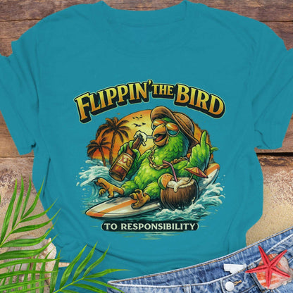 Teal Unisex t-shirt featuring a cartoon parrot relaxing on a surfboard with beer and coconut drink under a tropical sunset, with the phrase “Flippin’ the Bird to Responsibility”