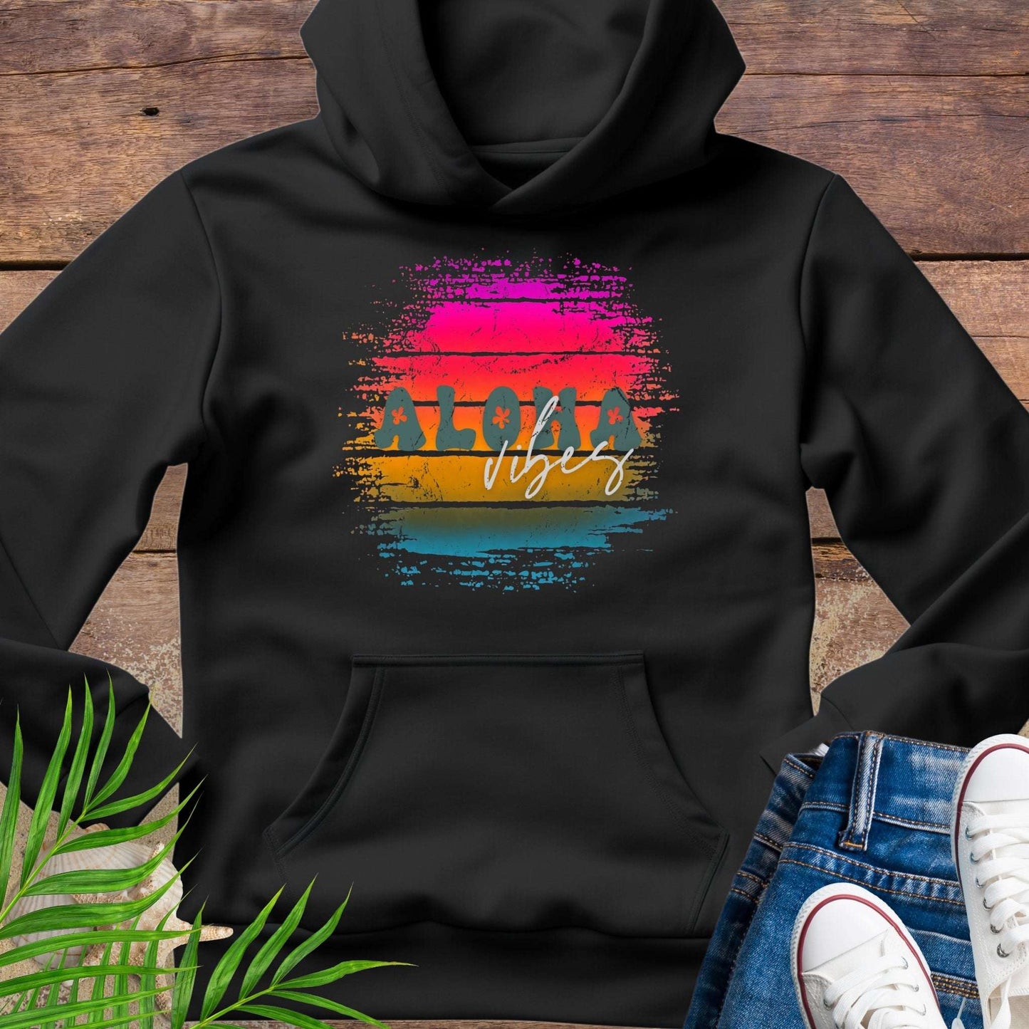 Black Unisex beach hoodie with vintage sunset aloha design.