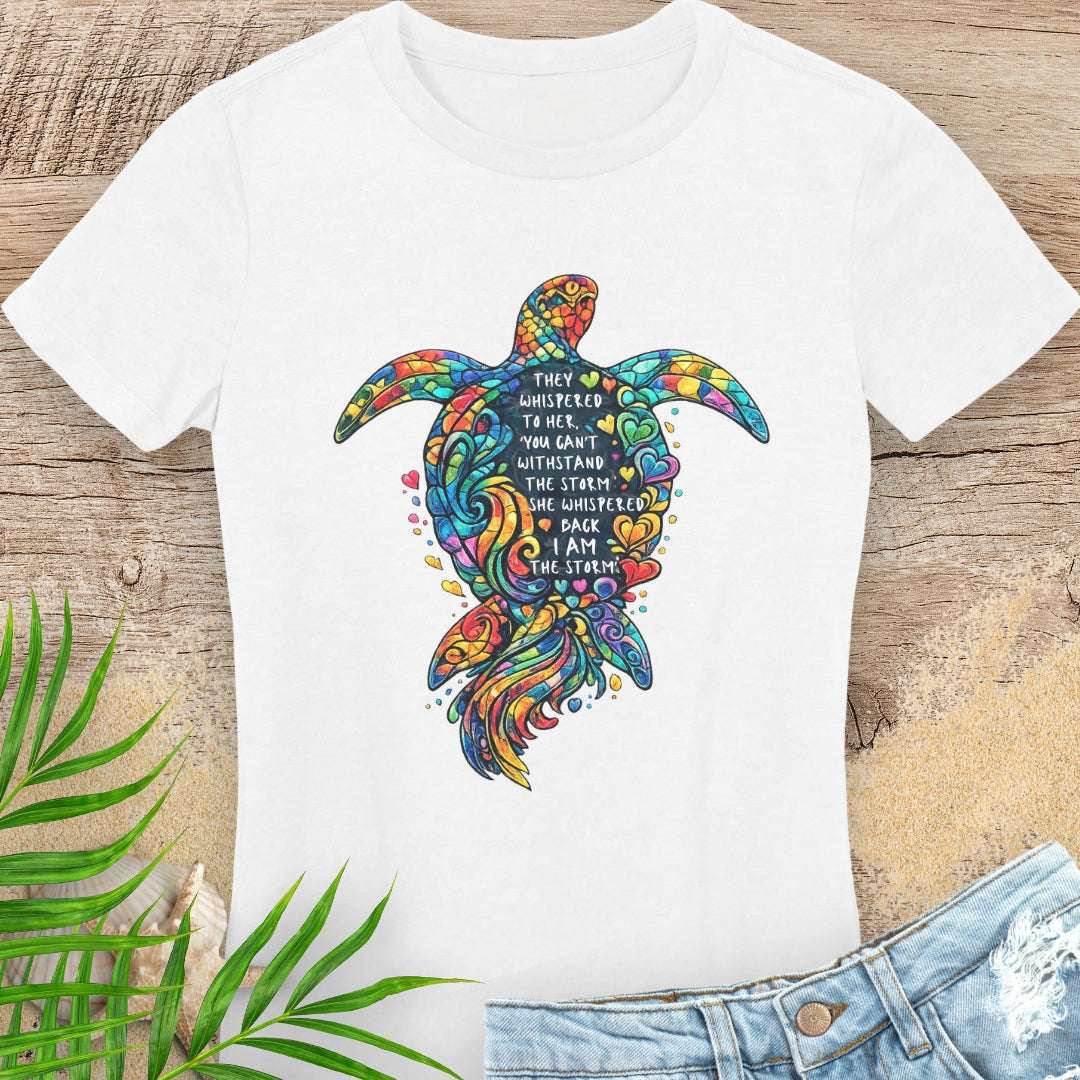 White t-shirt with a colorful sea turtle design with a motivational quote.