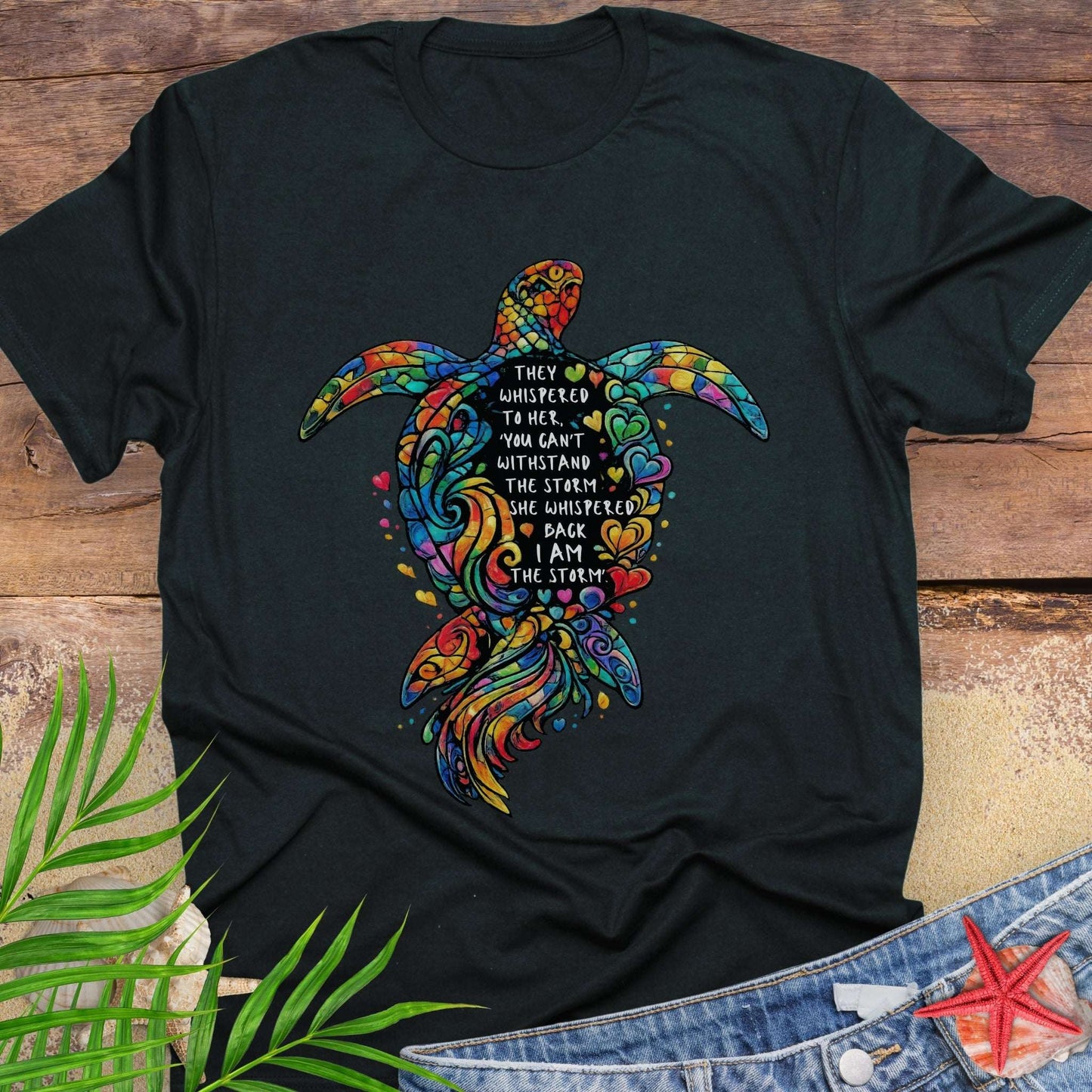 Black Unisex sea turtle shirt with empowering quote “I Am the Storm” and hand-drawn ocean turtle artwork