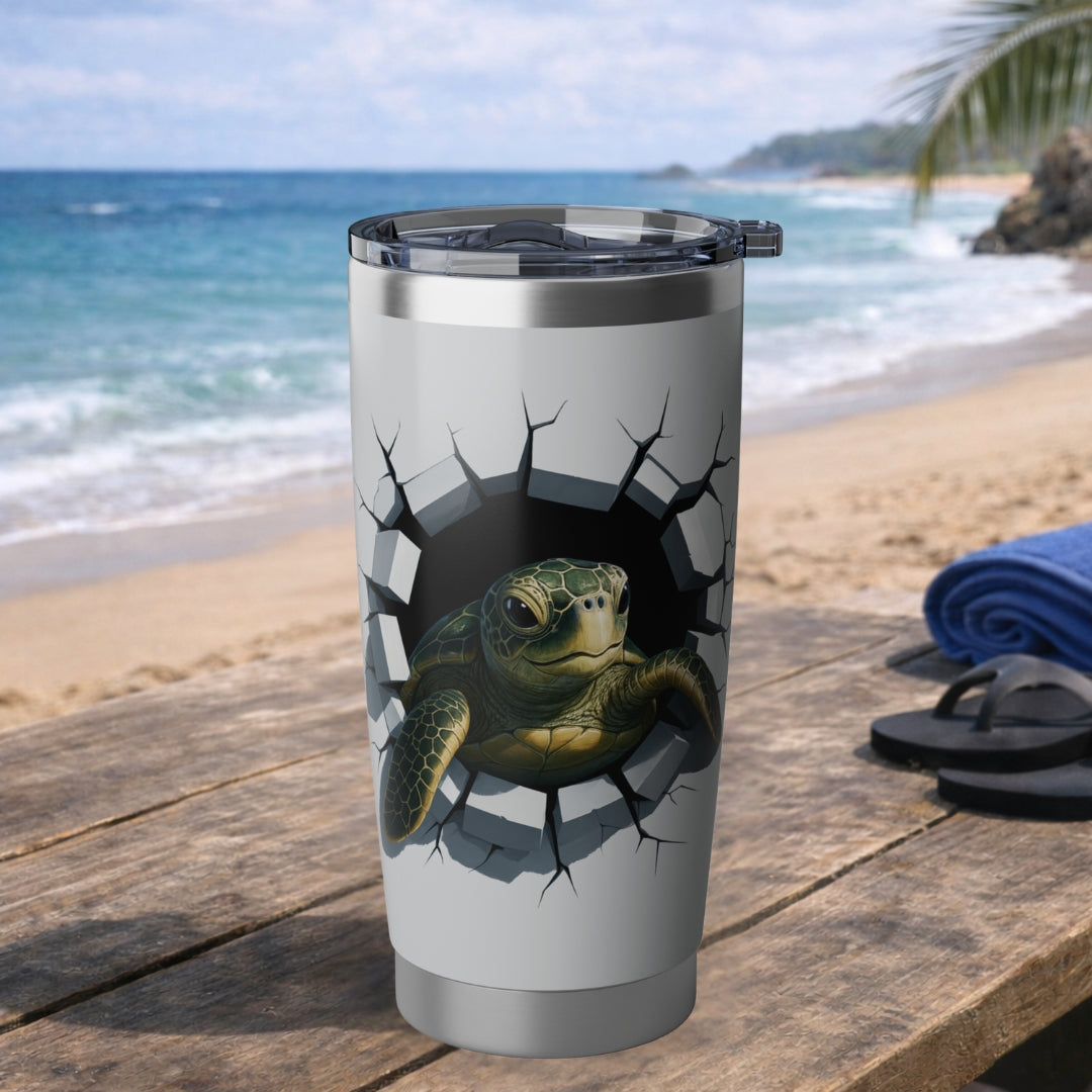 Tumbler with a sea turtle design on a beach setting