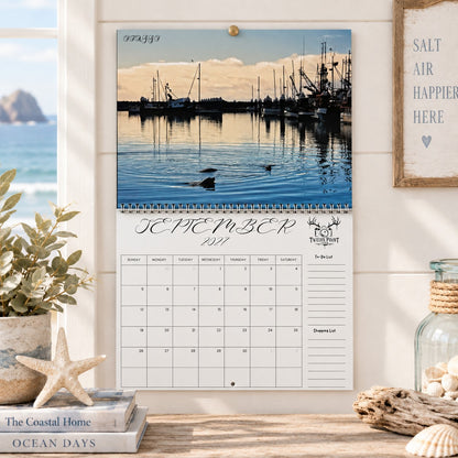 A wall-mounted September 2027 wall calendar monthly planning grid with to-do list and shopping list featuring Twelve Point Pics photography