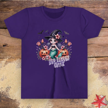 Purple kids t-shirt with “Boo Lagoon Cutie” text, a cute witchy mermaid, pumpkins, bats, and flowers.