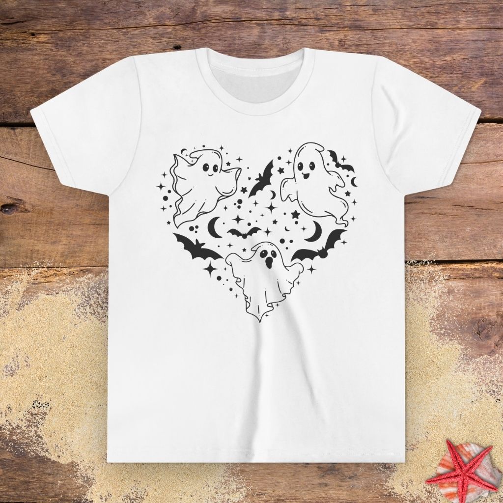 White youth t-shirt with black ghost heart design featuring cute ghosts, bats, stars, moons, and spooky Halloween line art.