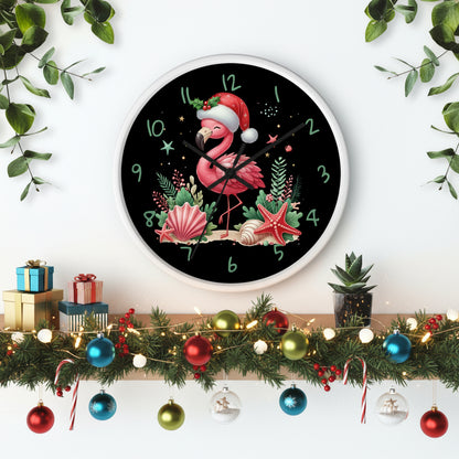 Wall clock with a flamingo wearing a Santa hat and Christmas decorations on a black background.