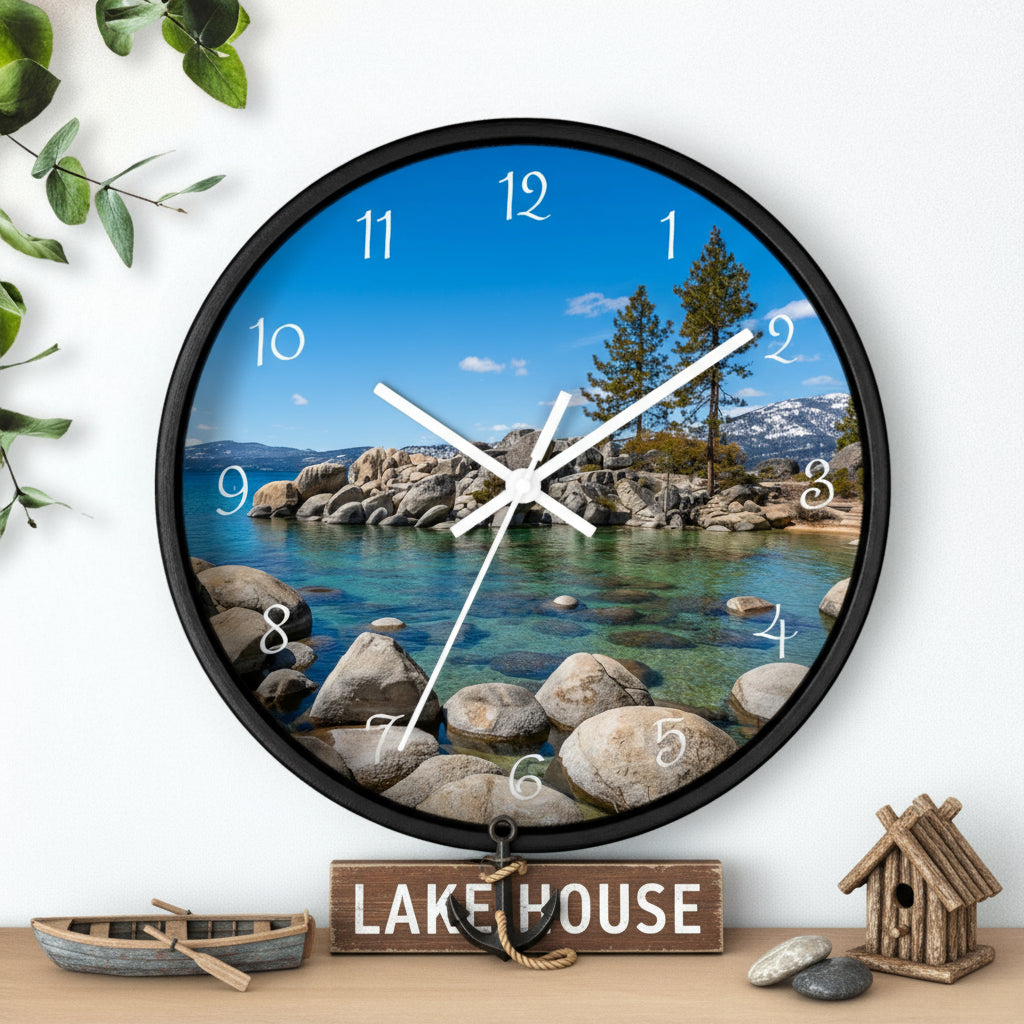 Wall clock with scenic design of a lake and mountains on a white wall.