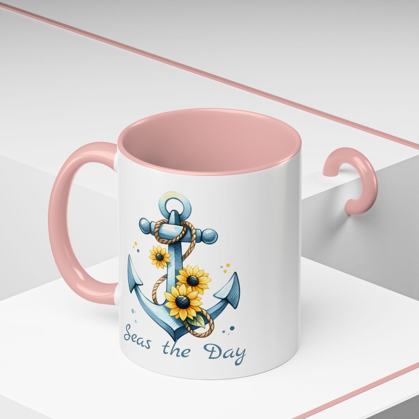 11 oz  White mug with pink handle and interior with Anchor and Sunflowers with text Seas the Day