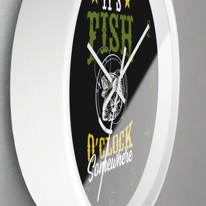 Wall clock with fishing-themed design and text on a black background