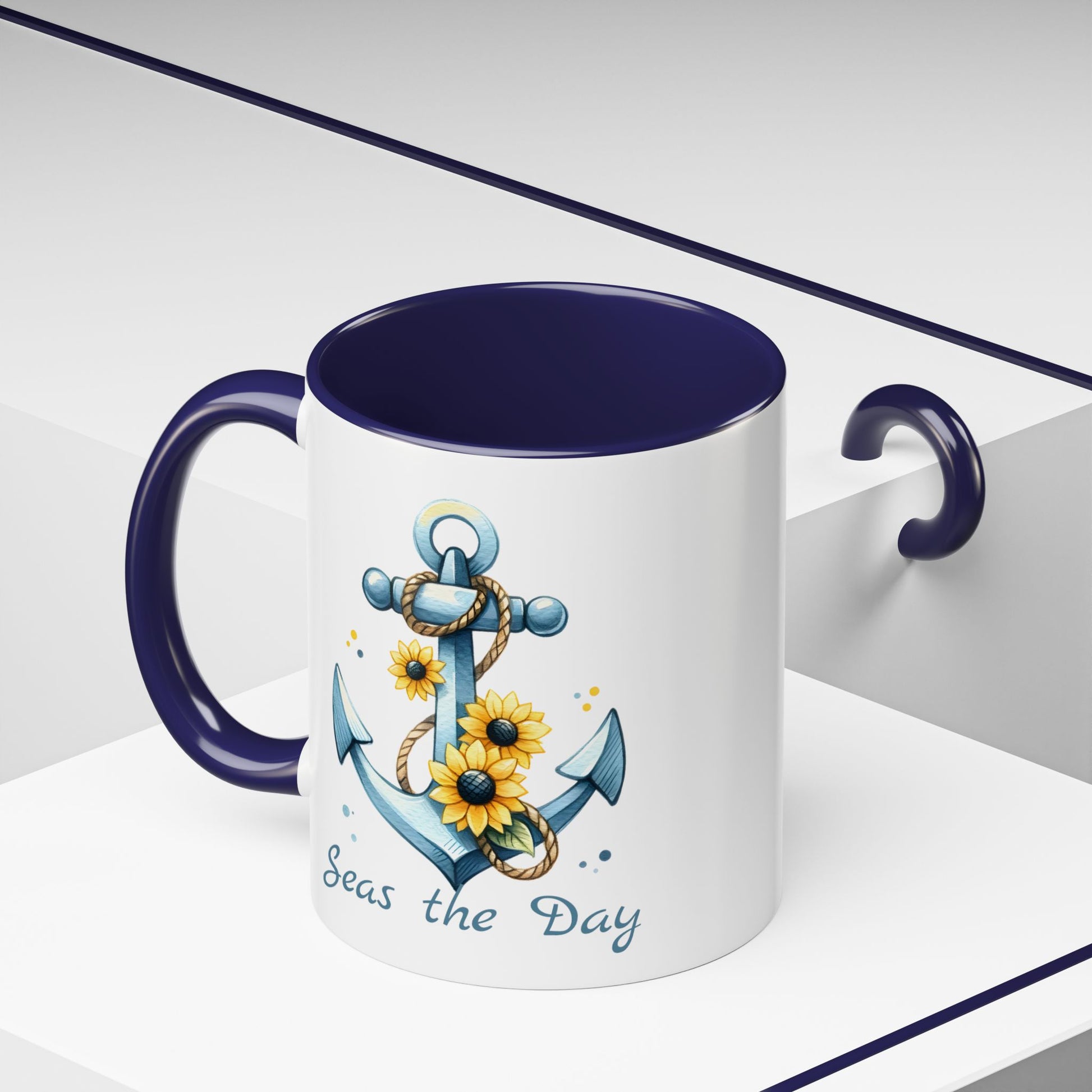 11 oz.  White mug with blue handle and interior with Anchor and Sunflowers with text Seas the Day