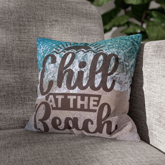 14" x 14" Decorative pillow with 'Chill at the Beach' text on a beach background. 
