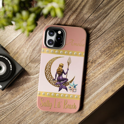 Phone case with mermaid design on a wooden surface