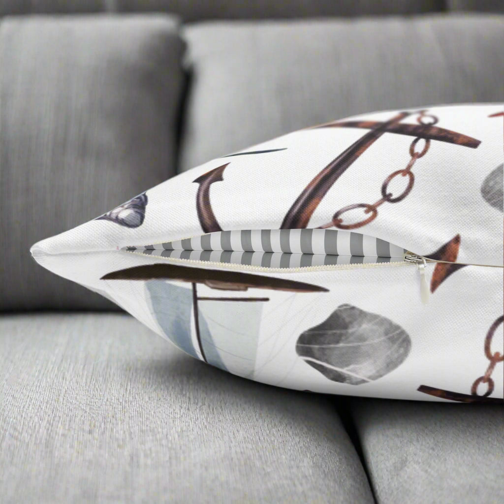Decorative pillow with anchor and chain pattern on a white background
