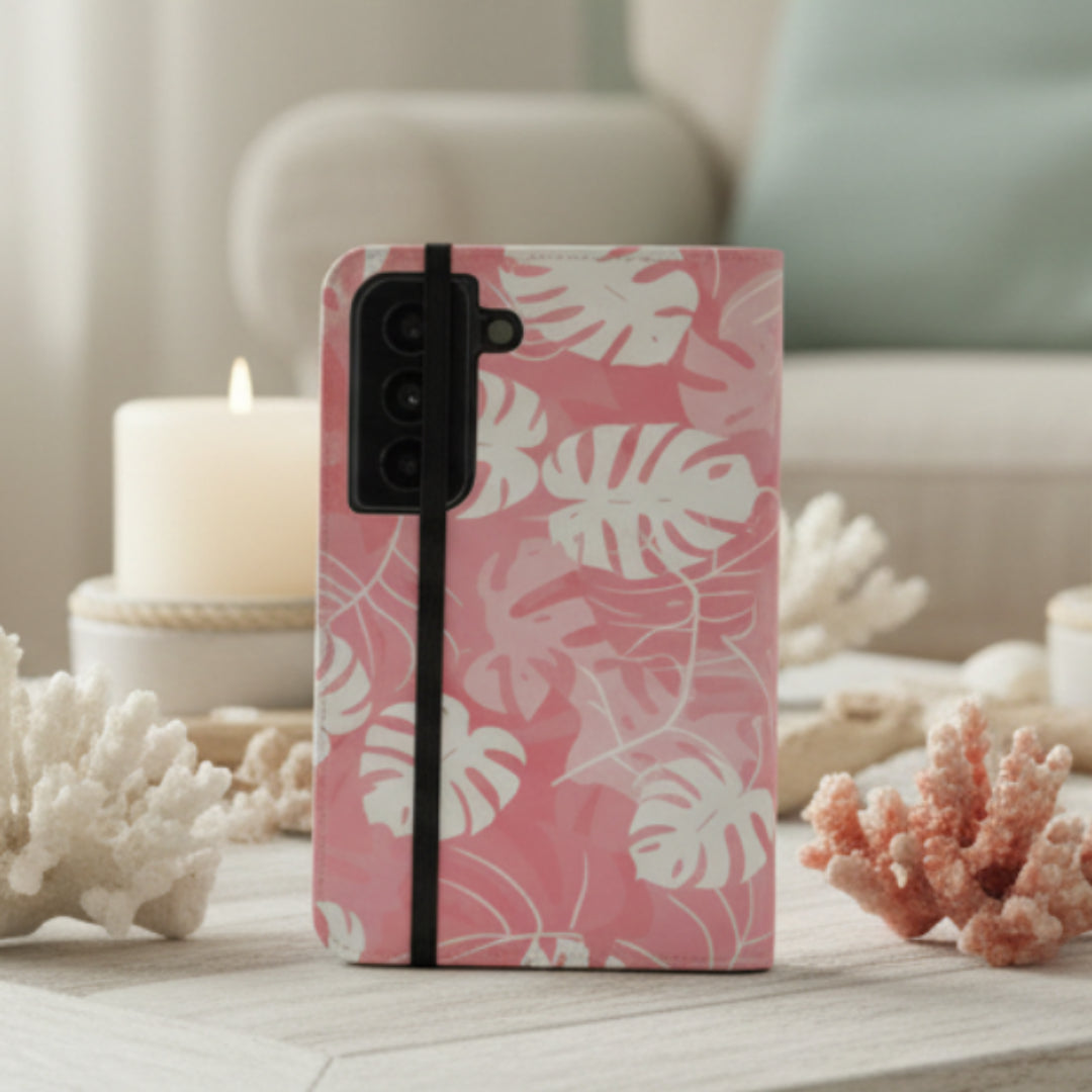 Phone case with pink and white leaf pattern on a white background