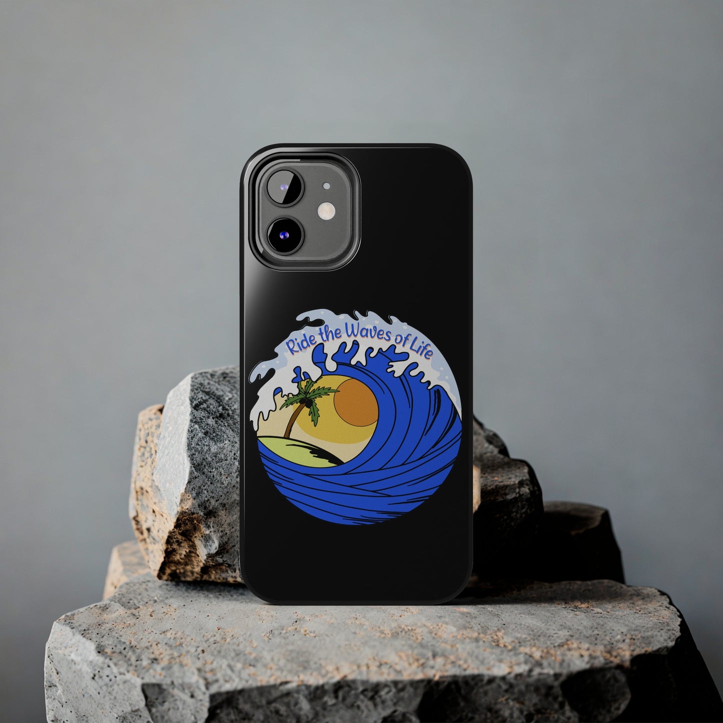 black Iphone Tough Case with a blue wave and sunset that says Ride the Waves of Life