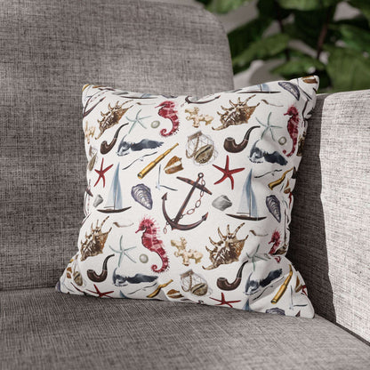 14" x 14" white pillowcase featuring detailed graphics of anchors, seashells, sailboats, and seahorses in a nautical-themed pattern.