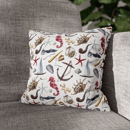 14" x 14" white pillowcase featuring detailed graphics of anchors, seashells, sailboats, and seahorses in a nautical-themed pattern.