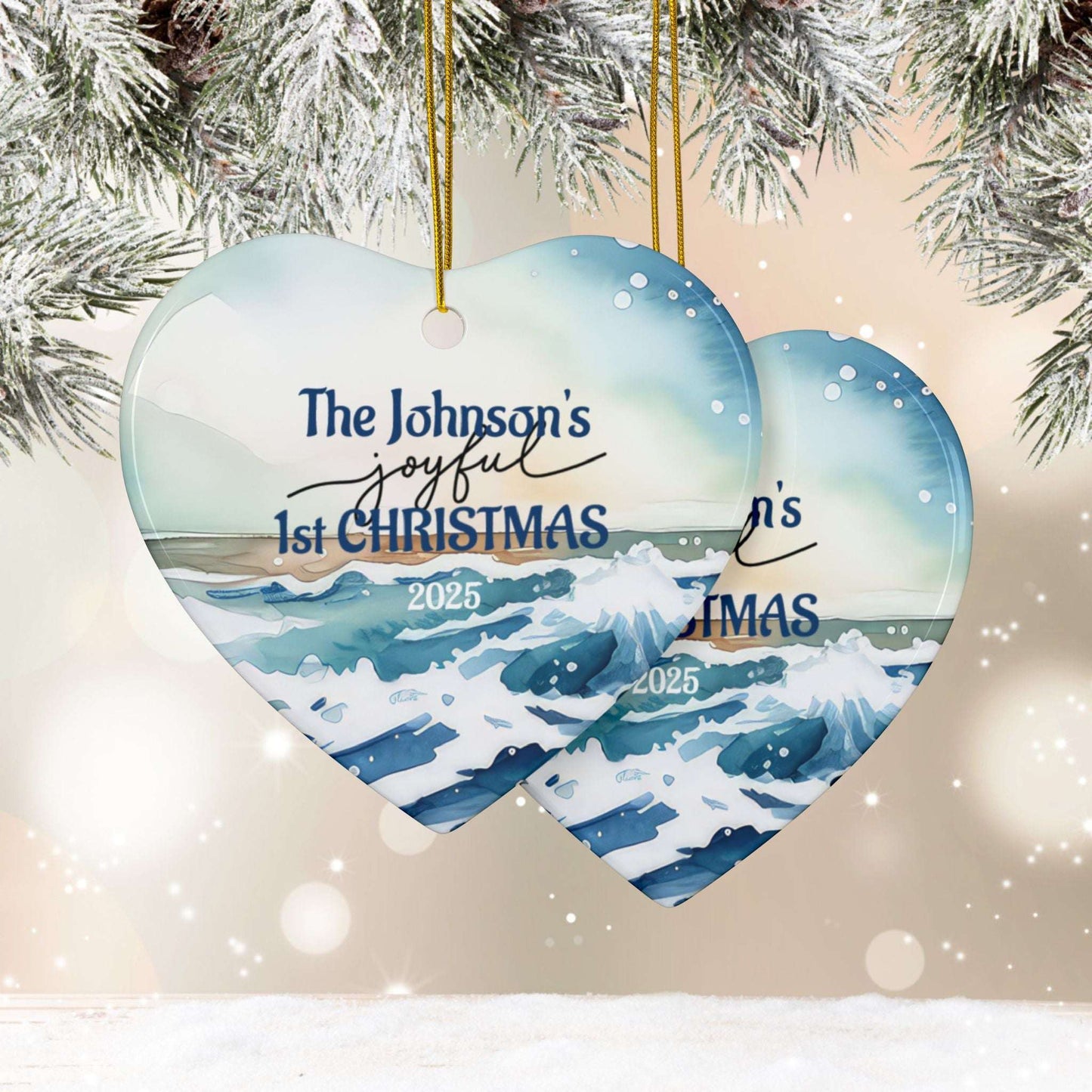 Heart-shaped Christmas ornament with 'The Johnson's joyful 1st CHRISTMAS 2025' personalized text, ocean design, and snowflakes.