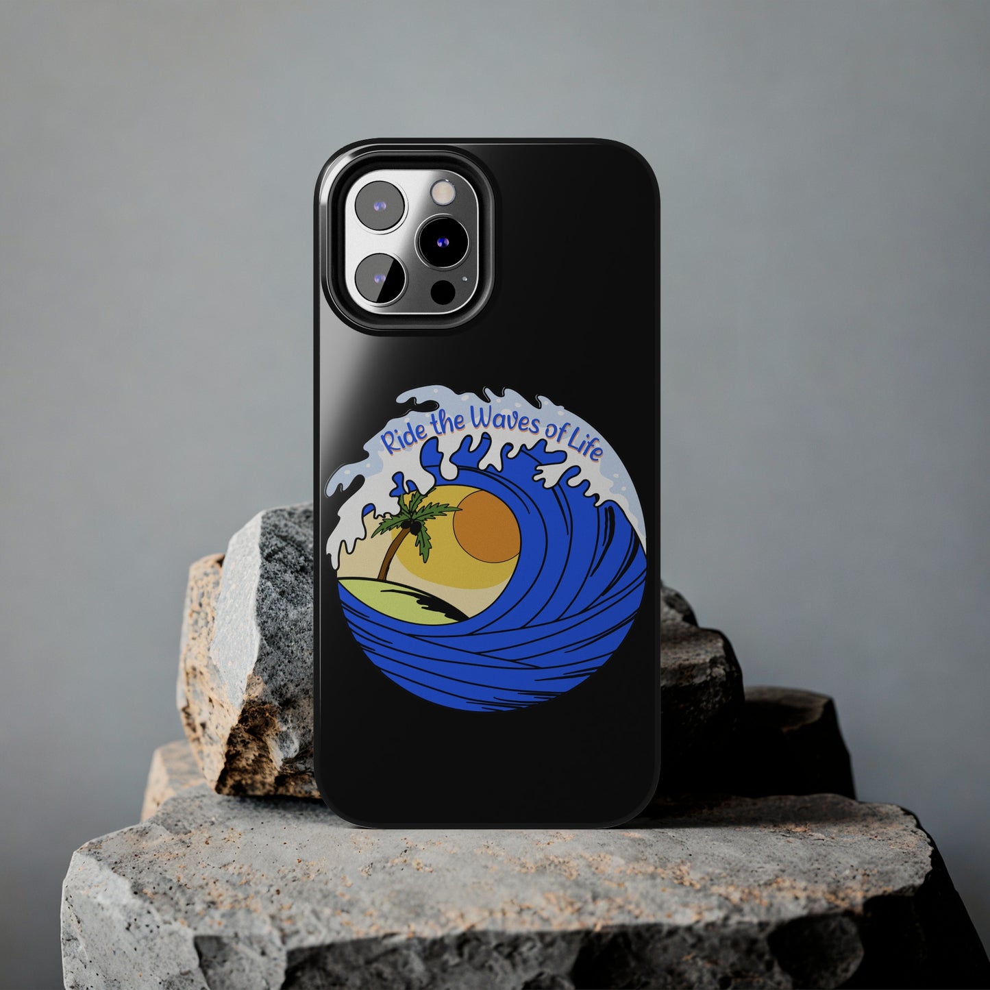 black Iphone Tough Case with a blue wave and sunset that says Ride the Waves of Life