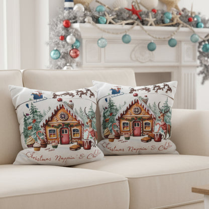 Decorative pillows with gingerbread house design on a  sofa.