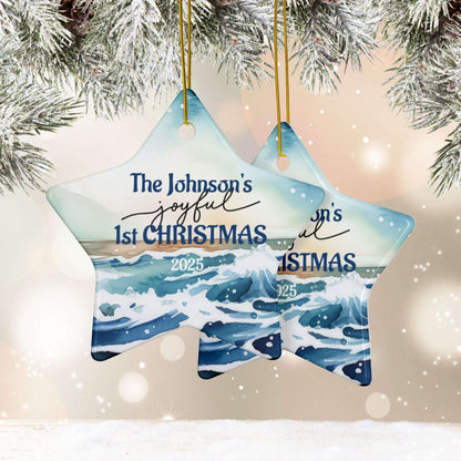 Star-shaped Christmas ornament with ocean design and 'The Johnson's joyful 1st CHRISTMAS 2025' personalized text, hanging against a snowy background.