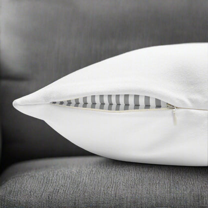 White pillow showing the concealed zipper closure.