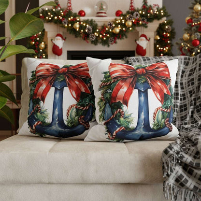 Decorative pillows with Christmas-themed designs on a sofa.
