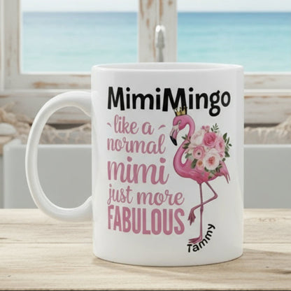 White mug with pink flamingo design and text on a white background