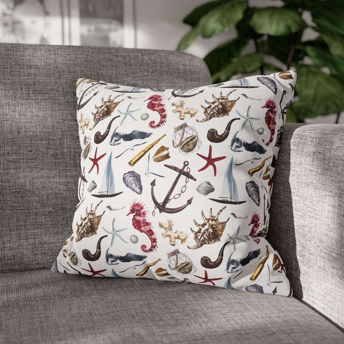 18" x 18" white pillowcase featuring detailed graphics of anchors, seashells, sailboats, and seahorses in a nautical-themed pattern.