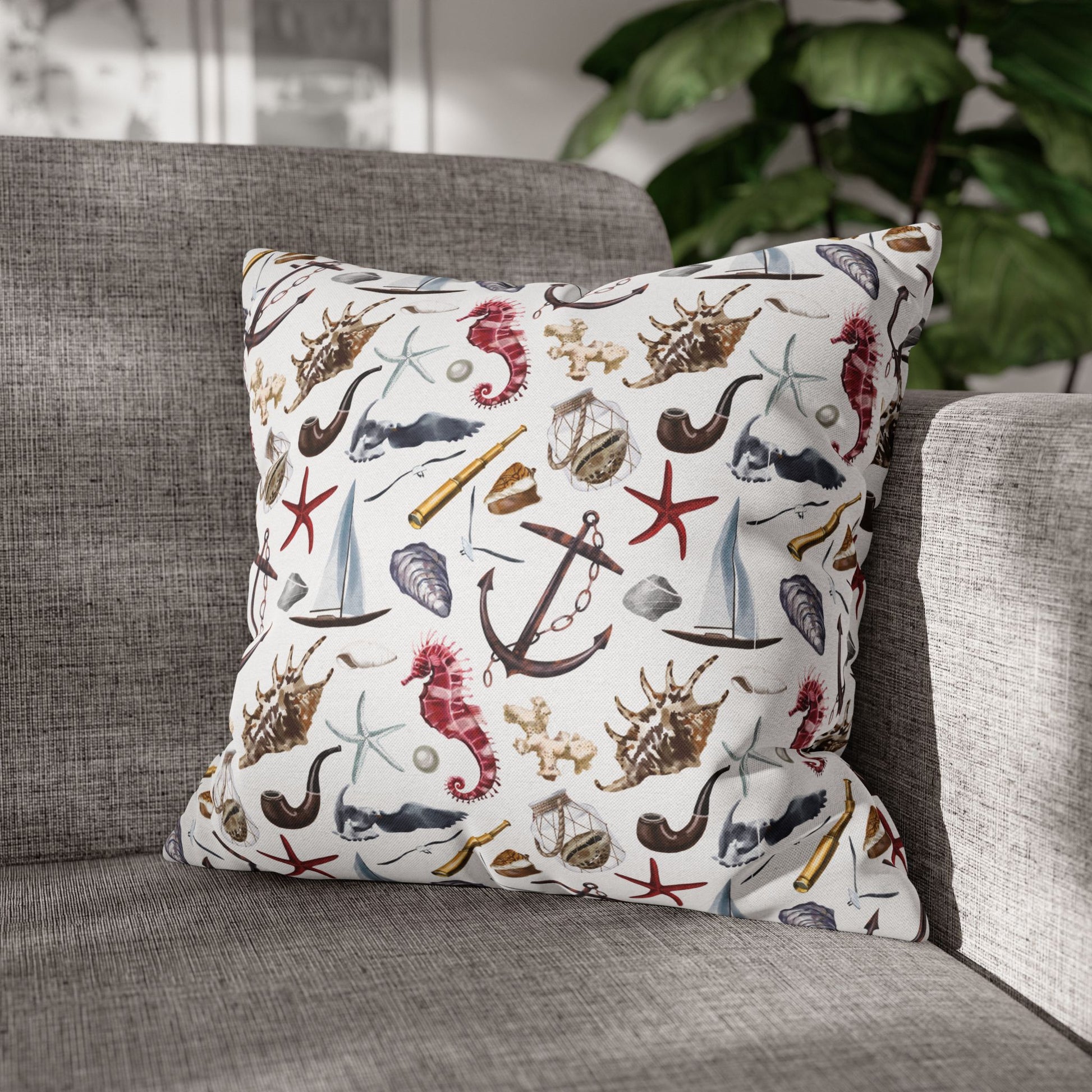 18" x 18" white pillowcase featuring detailed graphics of anchors, seashells, sailboats, and seahorses in a nautical-themed pattern.